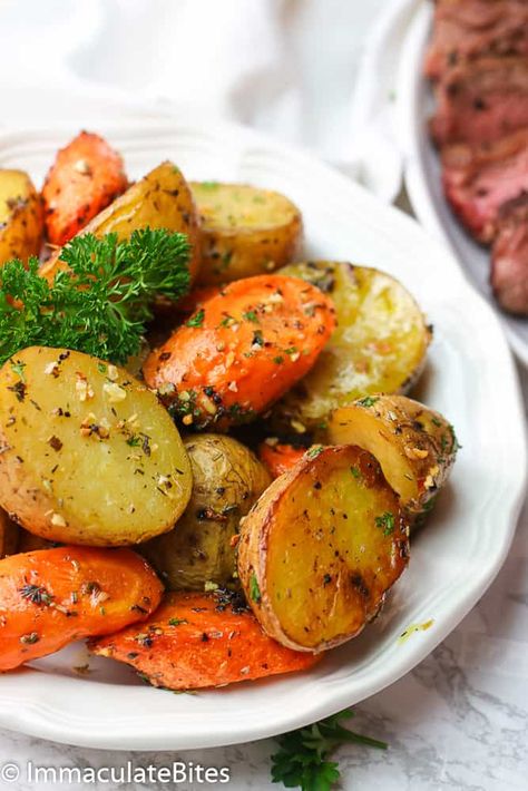 Roast Potatoes and Carrots - Immaculate Bites Garlic Roasted Zucchini, Garlic Herb Roasted Potatoes Carrots And Zucchini Recipe, Zucchini And Potato Recipes, Garlic Herb Roasted Potatoes, Roasted Potatoes Carrots, Vegan Zucchini Recipes, Herb Potatoes, Carrots And Zucchini, Roasted Potatoes And Carrots