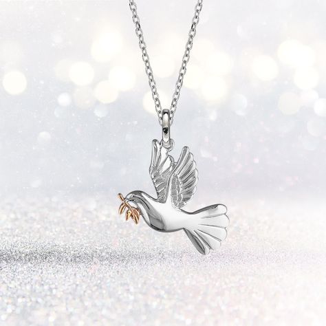 A beautiful addition to our Songs of Ink and Steel collection, our Sterling Silver dove necklace is a stunning yet simple, pendant that's perfect to bring strength and uplift spirits. Each necklace features a beautiful dove carrying a warm golden laurel leaf. Across cultures, the dove represents purity, gentleness, devotion, beauty, and faith. On an international level, peace dove represents hope and peace, and that has resonated well across the vast majority of religions and cultures. All of wh Dove Necklace Aesthetic, Dove Pendant, Dove Jewelry, Dove Necklace, Couples Gifts, Simple Pendant, Laurel Leaf, Flower Pot Crafts, The Dove