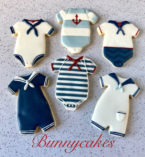 Sailor onesie sugar cookies for a nautical baby boy shower. Follow Bunnycakes on Instagram @bunnycakesandcookies and on Facebook @bunnycakes ⚓️ Nautical Theme Cookies, Nautical Baby Shower Cookies, Sailor Theme Baby Shower For Boy, Boy Onesie Cookies, Baby Shower Cookies For Boy, Nautical Baby Shower Girl, Nautical Food, Nautical Cookies, Baby Shower Cupcakes For Boy