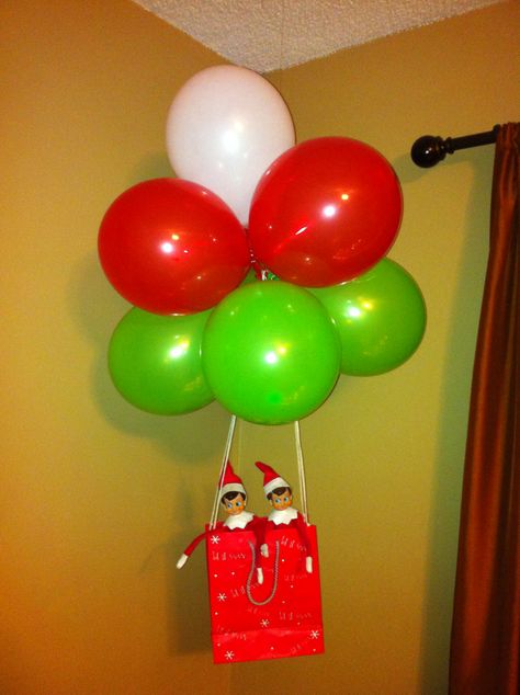 Elf On The Shelf Up High Ideas, Elf On The Self Balloon, Elf On The Shelf Arrival Ideas Balloons, Elf On The Shelf Balloon Arrival Ideas, Elf On The Shelf Balloon Ideas, Elf On The Shelf Arrival Balloon, Elf With Balloons, Elf On The Shelf Hot Air Balloon Arrival, Elf On The Shelf Balloon