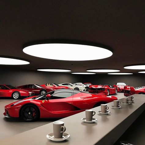 Ferrari collector @swizzcars's personal garage is that awesome he can hold his own Cars & Coffee event any day of the week. Not even joking! ☕️🏎 Photos are by the lucky photographers who got a peek into the Ferrari Headquarters of World Domination (disclaimer: NOT its name at all...but you could be forgiven for thinking so with these interstellar lights!?✨) 📸 Photos 2-4 by @zachbrehl & 📸 5-8 by @carswithluke ✨ #f12tdf #Enzo #f40 #f50 #madeinitaly #ferrari #ferrarif12 #ferrarif40 #ferrarif50 # Ferrari Garage Ideas, Ferrari Garage, Cars Garage, F12 Tdf, Garage Design Interior, Luxury Car Garage, Underground Garage, Wallpaper Luxury, Luxury Garage