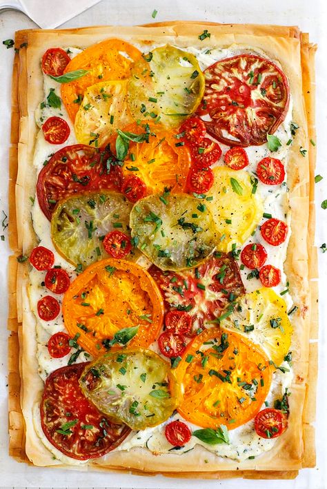 Tomato Ricotta Phyllo Tart Recipe -- An easy, fresh and flavorful phyllo tart with flaky pastry layers, chopped herbs, fresh heirloom tomatoes and a ricotta spread. girlversusdough.com @girlversusdough #girlversusdough #appetizer #easydinner Phyllo Tart, Tomato Tart, Tomato Pie, Savory Tart, Mango Salsa, Tomato Recipes, Tart Recipes, Pastry Recipes, Veggie Dishes