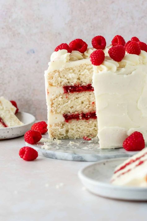 This almond raspberry cake has three soft and fluffy almond cake layers with a sweet raspberry jam filling. The whole cake is covered in an almond buttercream frosting. Rasberry Filling, Almond Raspberry Cake, Almond Joy Pie, Almond Poppy Seed Cake, Almond Buttercream Frosting, Raspberry And Almond Cake, Almond Frosting, Almond Buttercream, Homemade Raspberry Jam