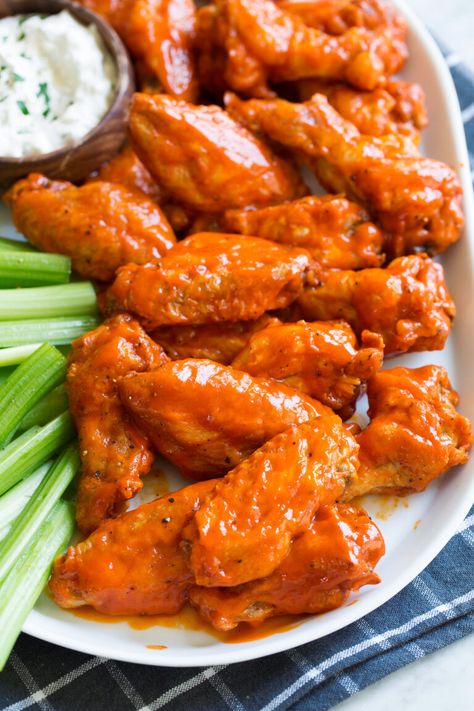 Baked Buffalo Wings With Blue Cheese Dip Baked Buffalo Wings, Crispy Baked Chicken Wings, Wings Recipe Buffalo, Chicken Wing Sauces, Buffalo Wing, Blue Cheese Dip, Spicy Wings, Buffalo Wing Sauce, Healthy Eating Breakfast