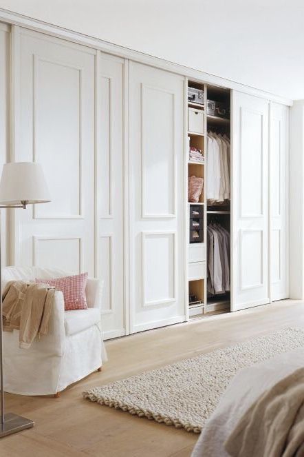 Love how beautifully these blend in Recess Wardrobe Ideas, European Closets Design, Wall Of Closet Doors, Wall Closets Ideas Bedroom, Couple Wardrobe Design, Built In Wall Closet Ideas Bedroom, Closets With Windows, Bedroom Closet Doors Ideas, Bedroom Closet Built In