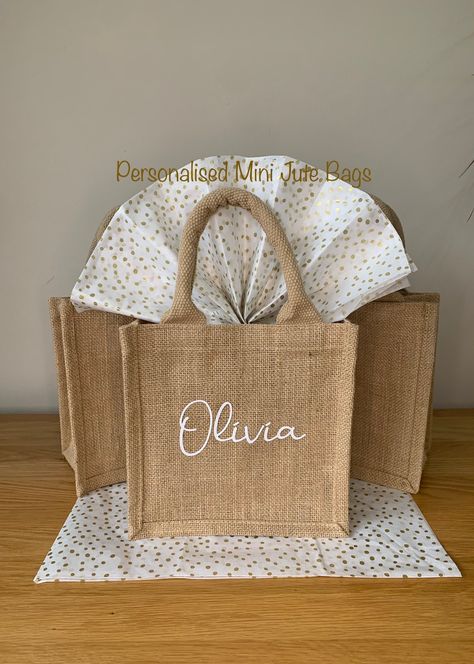 A beautiful Jute gift bag personalised with bridesmaids/friends names in a stylish white script font.  A perfect reusable bag to store your bridesmaids, hen party or bachelorette gifts. A lovely personalised momento for your friends to keep to remember your special day. The small bag measurements are: Cotton carry handles Height including handles 30cm Dimensions: 20 x 20 x 12cm Capacity: 4 litres The price is for each bag, tissue paper/wrapping for illustration purposes only. If you do require a Hen Do Party Bags, Hen Party Bags Fillers, Bachelorette Party Gift Bag, Hen Do Party, Hen Party Bags, Hen Party Gifts, Tissue Paper Wrapping, Bridesmaid Gift Bags, Bridesmaid Bags