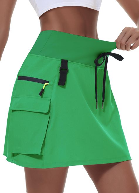 PRICES MAY VARY. 【Are Skirts Good for Hiking?】Skirts for hiking provide a fun flow to your outfit. Additionally, they provide greater range of motion, as well as enhanced breathability and air flow, the compression inner shorts designed to prevent chafing through long time hiking trip 【Ample storage space】2 zippered pockets and 2 large velcro pockets making this skort truly a cargo, the front loop design can easily hang compass or other hiking essentials The durable polyester and spandex blend f Hiking Skirts, Golfing Women, Hiking Essentials, Tricot Fabric, Loop Design, Casual Wear Women, Hiking Women, Women Cargos, Designer Shorts