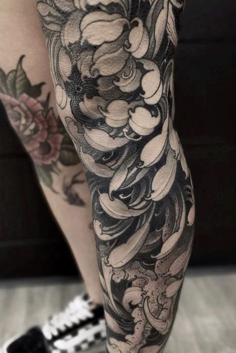 Discover the rich symbolism and Japanese history behind chrysanthemum tattoos. From delicate blooms to bold statements, find your perfect design here. Asian Flower Tattoo, Black Chrysanthemum Tattoo, Chrysanthemum Tattoos, Crisantemo Tattoo, Black Skull Tattoo, Japanese Flower Tattoo, Chrysanthemum Tattoo, Sak Yant Tattoo, Geniale Tattoos