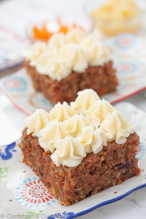 This award-winning Carrot Cake recipe features a smooth tangy cream cheese frosting - this easy homemade Easter dessert is super simple to throw together and feeds a large crowd. Super moist with pineapples, chopped nuts raisins, coconut and grated carrots! Better than Starbucks #easycakerecipes #brunch Award Winning Carrot Cake Recipe, Cake Traybake, Easy Easter Desserts, Best Carrot Cake, Amazing Desserts, Large Crowd, Pineapple Cake, Carrot Cake Recipe, Easter Dessert