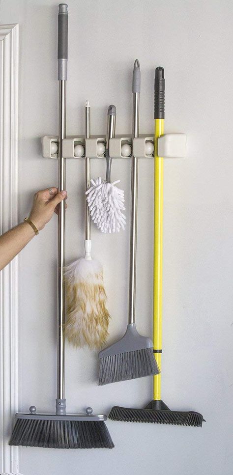 Amazon.com: Magic Holder 5 Position Mop and Broom Holder, Floor Mop Holder, Broom Utility Holder, Storage Solutions and Organizers for Cleaning: Home & Kitchen Kitchen Wall Organizer, Garage Wall Organizer, Mop Storage, Broom Storage, Wand Organizer, Diy Organizer, Mop Holder, Garage Organization Diy, Broom Holder