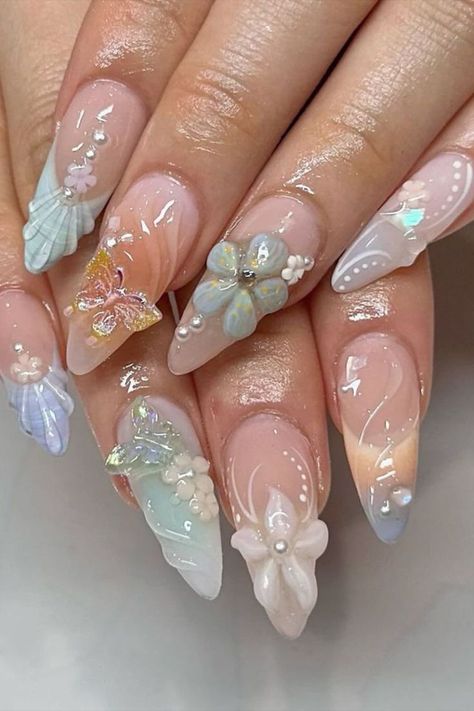 Achieve a harmonious blend of soft pastel tones and vibrant colors with this nail design by @shi_nailedit featuring 3D flowers and butterflies, creating a whimsical and enchanting look that’s perfect for adding a pop of color to your style while maintaining a delicate and feminine aesthetic. Don't miss out on the latest trends in nail art! Head over to nailustrous.com now to dive into our comprehensive article and discover a world of stunning ideas waiting just for you! Cute Nails 3d Flowers, Nail Art With Flowers Design, 3d Nails Aesthetic, Nail Inspo 3d Art, Nail Designs 3d Art, Colorful 3d Nails, Pastel Colorful Nails, Nail 3d Art, Butterfly 3d Nails