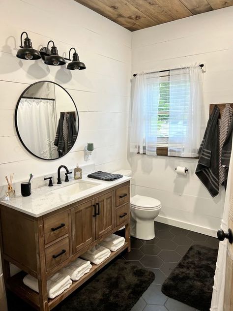 Rustic farmhouse bathroom Bathroom Grey Hexagon Tile Floor, Vanity With Black Tile Floor, Dark Tile Bathroom Floor White Walls, Black And White Bathroom Ideas Decor Accent Walls, Black White Rustic Bathroom, Wood Vanity Black Floor, Nickel Gap Bathroom, Black Floor Powder Room, Bathroom Remodel Black Floor