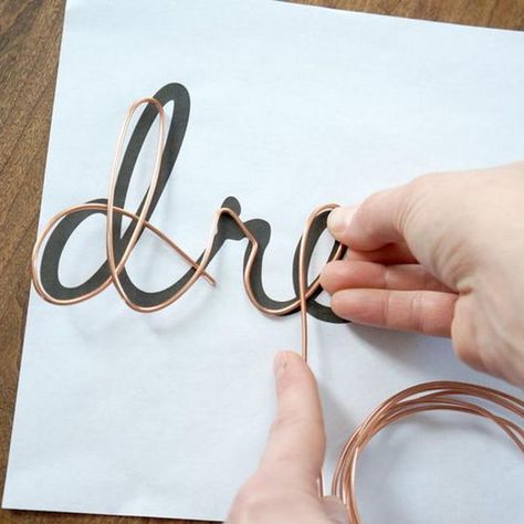 Copper wire has many unique properties. It is bendable, flexible and versatile in a variety of projects. People are also finding more and more uses for these qualities, which has turned copper wire into a popular material for different projects. While crafting with wire couldn’t be easier and some wire crafting can consist of elaborate [...] Word Art Tutorial, Sculptures Sur Fil, Copper Wire Crafts, Wire Letters, Pola Macrame, Art Fil, Wire Wall Art, Wire Diy, Word Wall Art