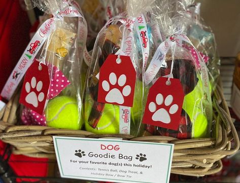 Holiday goodie bag for dogs: Contains a tennis ball, a handmade flannel bow tie, and a store bought dog treat. Added a ribbon and Cricut-cut "to / from" tag with a paw print. Made for a holiday craft fair. For bow tie: used fat quarter fabric and Dollar Tree hair ties cut in half / sewed on for attaching to collars. Holiday Craft Fair, Dog Christmas Photos, Christmas Dog Treats, Christmas Goodie Bags, Fat Quarter Fabric, Blessing Bags, Dog Treat Bag, Christmas Treat Bags, Gift Bags Diy