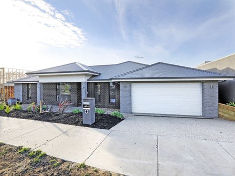 Basalt roof and gutters. Surfmist fascia, garage door and render. Monument windows. Colorbond Roof Colour Schemes, Shale Grey Garage Door, Shale Grey And Monument Exterior, Shale Grey Colorbond Roof, Shale Grey Roof Colour Schemes, Surfmist Garage Door, Basalt Colorbond Roof, Surfmist Roof Colour Schemes, Basalt Roof Colour Scheme