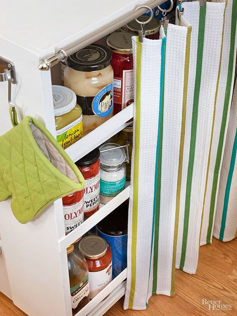 Turn a bookcase into a petite movable pantry with the addition of casters and painted lath attachments designed to secure pantry goods when the cart is in motion. Add a curtain rod to support kicky clipped-on dish towels that can be drawn closed to keep supplies under wraps until they're needed./ Decor Cozinha, Cafe Rod, Decorating Above Kitchen Cabinets, Open Cabinet, Above Kitchen Cabinets, Barbie Outfits, Small Kitchen Decor, Rolling Storage, Shabby Chic Bedroom