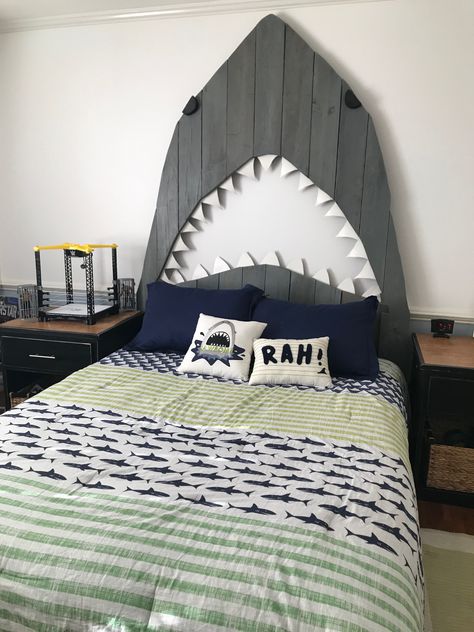 The shark headboard I made for my son :) Shark Themed Bedroom Kids, Shark And Dinosaur Bedroom, Kids Shark Bedroom, Toddler Shark Room, Shark Themed Bedroom Boy Rooms, Shark Toddler Room, Shark Bedroom Decor, Boys Shark Room, Shark Bedroom Boys