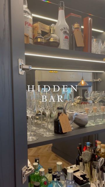 Daval | Made-to-Measure Fitted Kitchens & Bedrooms on Instagram: "Hidden in plain sight! Incorporating a hidden bar area like this one into a kitchen design is the ultimate way to get the partystarted. What do you think? Let us know below. #kitchen #kitchendesign #bar #hiddenbar #hiddenbars #homebar #homebartender #kitchenideas #kitcheninspiration #kitcheninspo #kitchenrenovation #kitchenreno #kitchenbar #daval #davalkitchens" Bar Cupboard, Fitted Kitchens, Hidden Bar, Hidden In Plain Sight, Bar Shelf, Kitchens And Bedrooms, Bar Area, Bar Areas, Kitchen Reno