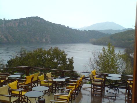 Lake Ziros- On top of an elevated forest stretch the visitor can find the cafe-restaurant Lake Ziros where they can enjoy good food, a coffee, relaxing music and immense views Lake View Restaurant, Greece Villa, Rustic Cafe, Garden Cafe, Lake Photos, Outdoor Restaurant, Holiday Villa, Restaurant Interior Design, Relaxing Music