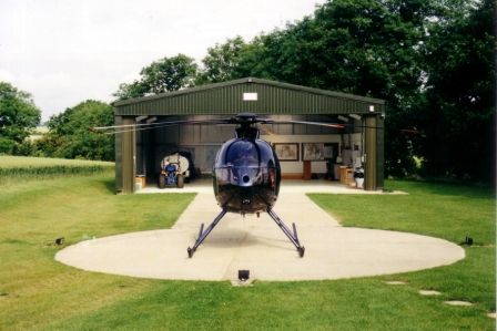 Helicopter Hangar Helicopter Pad Home, Aircraft Hangar Design, Helicopter Hangar, Hangar Home, Hangar Design, Boutique Store Displays, Holiday Cabin, Goal Ideas, Aircraft Hangar