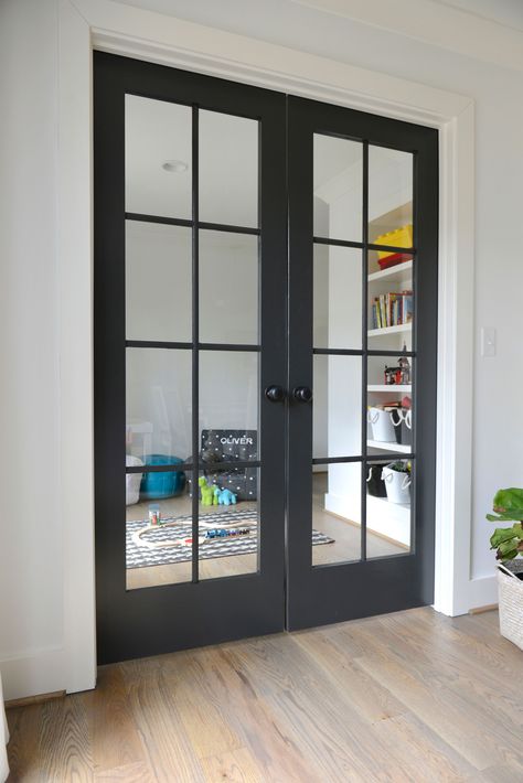 Playroom; Iron Ore French Doors Double Doors Between Rooms, Playroom French Doors, Wood French Doors Living Room, Black Iron Office Doors, Glass French Office Doors, Den With Glass French Doors, Den French Doors, Entryway Office Doors, Large French Doors Office