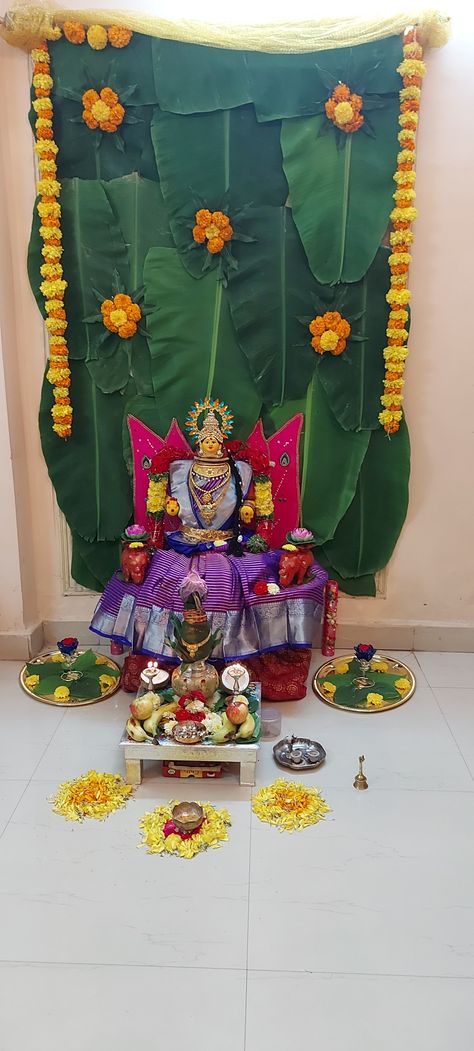 Varamahalakshmi pooja decoration 2021 Banana Leaf Background Decoration, Leaf Background Decoration, Pooja Background Decoration, Banana Leaf Background, Pooja Background, Banana Leaf Decor, Varalakshmi Pooja, Mandir Decoration, Marigold Flowers