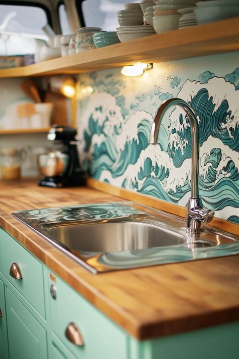 Retro surf van kitchen. Mint green cabinets, oak wood counters, teal wave-patterned backsplash.

Calling all free-spirited adventurers and vintage lovers! Get ready to fuel your wanderlust and kitchen creativity with our list of 55 vintage surf van kitchen ideas. These aren't just designs, they're hidden gems that'll bring a whole new level of functionality to your classic ride. Oh, and let's not forget…

Read more: https://tastyinteriors.com/generated-post-55-vintage-surf-van-kitchen-ideas/ Surfer Kitchen, Van Kitchen Ideas, Surf Shack Kitchen, Mint Green Cabinets, Skoolie Kitchen, Patterned Backsplash, Wood Counters, Retro Beach House, Van Kitchen