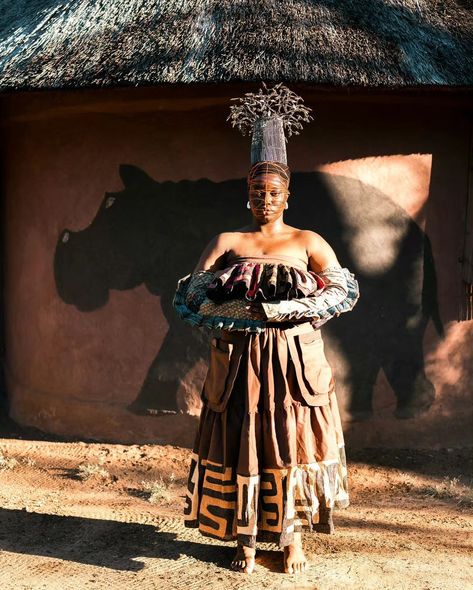 Nicole Rafiki (pictured in the last two frames), an interdisciplinary artist, integrates textiles such as Kuba cloth (shown in the photos above) into her work to delve into themes of remembrance, healing, and cultural analysis. Drawing from her Congolese heritage, she blends photography, beadwork, and textiles to challenge Western anthropological perspectives and address issues like forced migration and racialized perceptions. Her artworks, rich in symbolism and storytelling, reclaim traditi... Cultures Aesthetic, Congolese Traditional Clothing, Congolese Culture Aesthetic, Different African Cultures, Cultural Representation Art, Tribe Fashion, African Traditional Religions, Women's Traditional & Ceremonial Clothing, Zulu Warrior