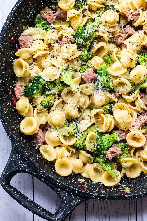 A simple recipe for pasta with sausage and broccoli that is perfect for any night of the week. The meaty texture of the broccoli and sausage is a superb combination that works well with the garlicky and slightly spicy pasta. This quick 25-minute pasta dish is not only super tasty but also healthy because it packs in a good dose of green veggies. Broccoli and sausage pasta is very versatile. I tend to choose orecchiette but other pasta types will also work well as will most types of sausage. Pasta Recipes Chicken Sausage, Creamy Pasta Recipes Chicken, Turkey Sausage Pasta, Sausage Broccoli Pasta, Broccoli And Sausage, Broccolini Pasta, Broccoli Sausage, Spicy Sausage Pasta, Sausage And Broccoli