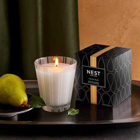 LUXURY GLASS CANDLE: 8.1-ounce decorative scented candle ideal for home relaxation and entertaining FRUITY AND MELLOW: Velvety Anjou pear and crisp apple blended with crushed lemon leaves, hints of peony, white musk, and amber LONG-LASTING ELEGANCE: Candles crafted with proprietary, premium wax formulated to burn cleanly and evenly for 50–60 hours #Ad As an Amazon Associate, I may earn a commission off qualifying purchases at no additional cost to you. Scented Candles Decor, Peony White, Nest Fragrances, Clear Glass Tumbler, Fragrance Packaging, Lemon Leaves, Crisp Apple, Classic Candles, White Candle