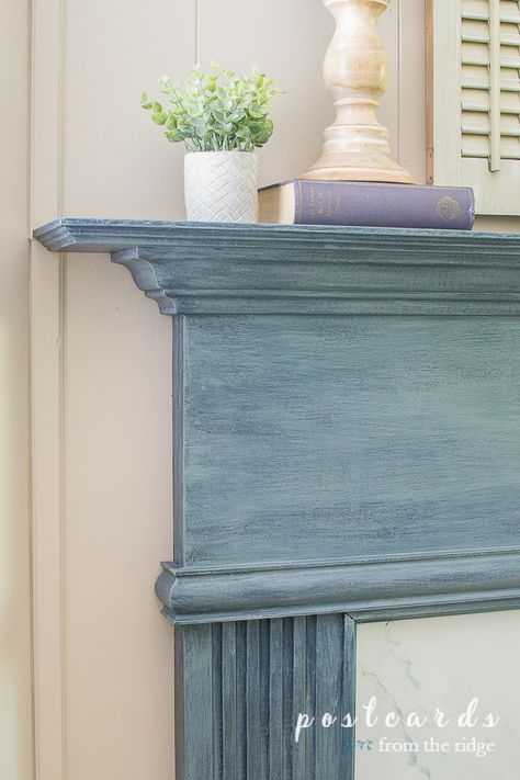 Such a great fireplace mantel makeover. And it was all done with paint! #diy #homeimprovement #fireplace #mantel Sw Cyberspace, Fireplace Mantel Makeover, Painted Fireplace Mantels, Mantel Makeover, Painted Mantle, Mantel Fireplace, Antique Mantel, Paint Fireplace, Blue Gray Paint