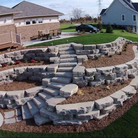 Michigan Landscaping, Backyard Retaining Walls, Sloped Backyard Landscaping, Terraced Landscaping, Sloped Yard, Sloped Backyard, Stone Steps, Landscaping Retaining Walls, Hillside Landscaping