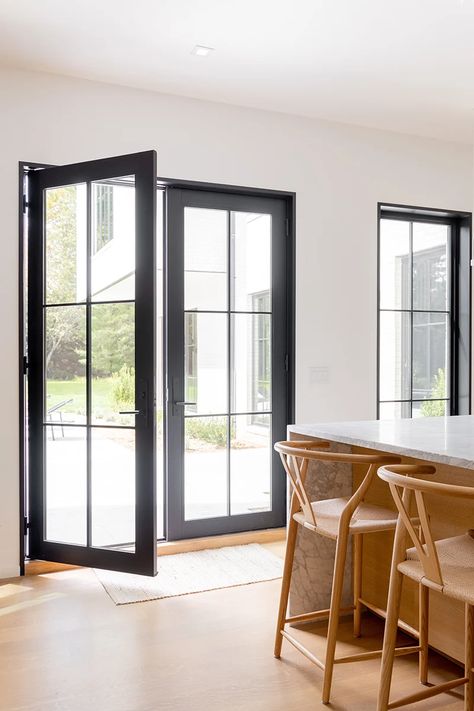 Moody Colors: Decorating with Black Windows & Doors | Marvin Modern French Doors Black, Black French Doors To Patio, Windows With Black Trim, Black Windows And Doors, Black Vinyl Windows, Black Windows Exterior, Decorating With Black, Black French Doors, Black Window Trims