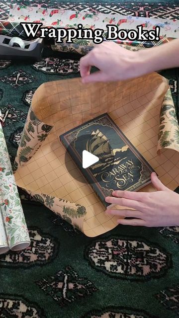 Madeline Burget | Grim Fantasy Author on Instagram: "How To Wrap A Book For The Holidays! 

Just keep it simple ❤️

#howtowrapabook #bookwrapping #giftwrapping #bookish #bookworm #indiebooks #books" How To Wrap A Book Cover, Packing A Book Gift, How To Wrap A Blind Date Book, Wrapping Books Ideas, How To Gift Wrap A Book, Wrapping A Book As A Gift, Wrap A Book Gift, How To Wrap A Book, Wrapping A Book