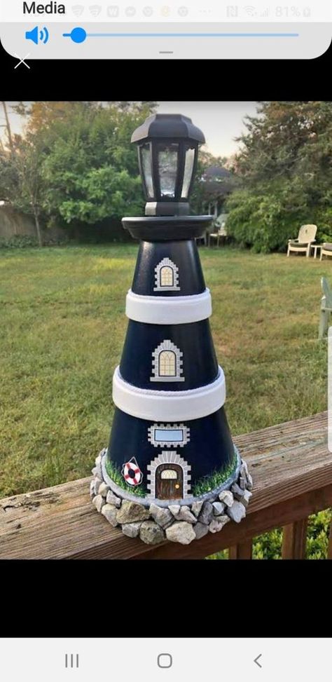 Clay Lighthouse, Front Door Painting, Lighthouse Diy, Front Porch House, Decorating Front Door, Door Painting Ideas, Diy Lighthouse, Clay Pot Lighthouse, Lighthouse Crafts