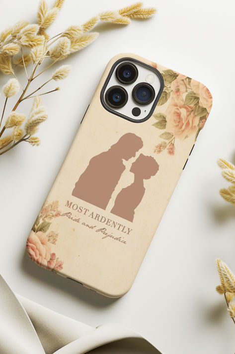 📚 Are you a Pride and Prejudice fan who adores diving into the timeless world of classic literature or looking for a Jane Austen gift?  Indulge your passion for Austen's literature with our exquisite phone case, meticulously crafted to capture the essence of Mr. Darcy and Elizabeth Bennet. 🌼 Let the world know your passion for timeless literature with this elegant and bookish merch.  You can find it in my Etsy Shop! Book Inspired Phone Cases, Bookish Phone Cases, Pride And Prejudice Bookmarks, Pride And Prejudice Phone Case, Pride And Prejudice Book With Letters, Most Ardently, Darcy And Elizabeth, Jane Austen Gifts, Elizabeth Bennet