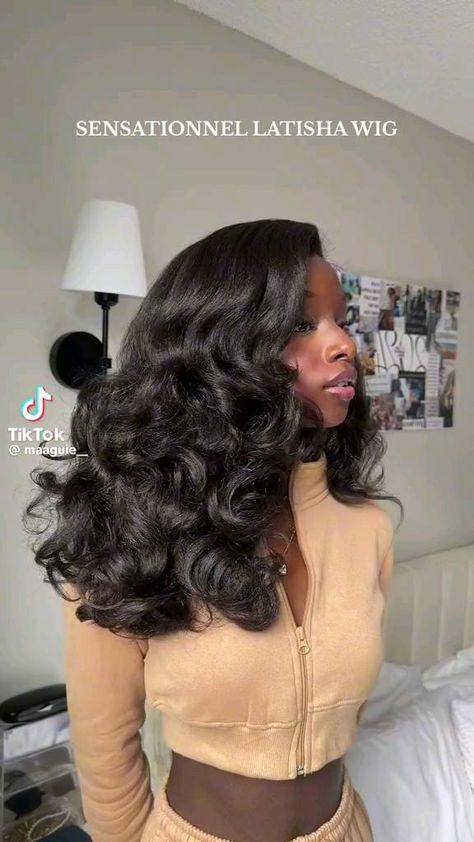 Witness the magic of a Latisha weave transformation in this video! Watch as a woman rocks this stylish and sleek hairstyle with confidence. Explore the versatility and beauty of Latisha weaves for your next hair inspiration. #LatishaWeave #HairTransformation #SleekStyle" African Wigs Hairstyles, Wavy Black Women Hairstyles, How To Style Weave Hairstyles, Black Woman Wig Hairstyles, Wig Looks For Black Women, Voluminous Wig Black Women, Sew In Synthetic Hair, Latisha Wig Styles, Sensationnel Wig Latisha