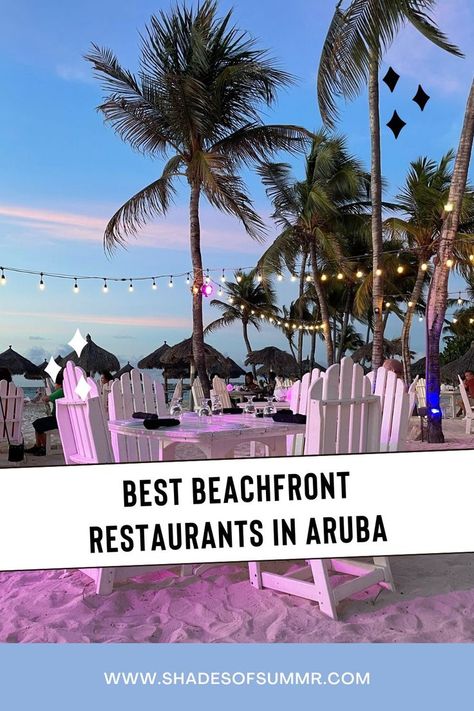 A picture of a white table in the sand with chairs, fairy lights and palm trees at sunset with text saying best beachfront restaurants in Aruba Aruba Pictures, Aruba Restaurants, Aruba Honeymoon, Palm Beach Aruba, Sunset Restaurant, Visit Aruba, Aruba Beach, Aruba Travel, Beach Dinner