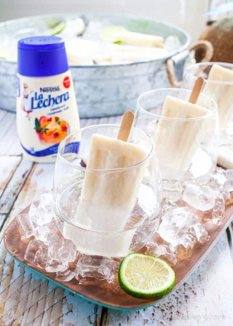 Summer coquito is a simple coconut rum and soda cocktail chilled and served with a creamy coconut popsicle. Popsicle cocktails are a great way to stay cool. Popsicle Cocktail, Coconut Popsicles, Boozy Popsicles, Puerto Rican Dishes, Edible Crafts, Puerto Rican Recipes, Coconut Rum, Fun Easy Recipes, Latin Food