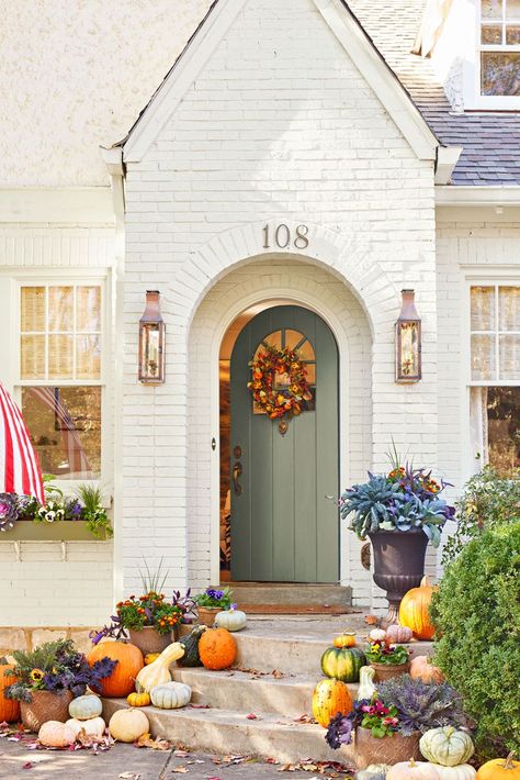 36 Best Pumpkin Decor Ideas To Try This Fall Shutter Paint Colors, Coral Front Doors, Bold Front Door Colors, Bold Front Door, Southern Farmhouse, Tudor Cottage, Exterior Makeover, Charming House, Tudor House