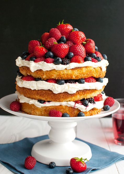 Forest Fruit Cake with Stabilized Whipped Cream Frosting - the whipped cream frosting is light and fluffy and creamy but holds it shape for days! | thetoughcookie.com Fruit And Cream Cake, Cream And Fruit Cake, Simple Fruit Cake, Stabilized Whipped Cream Frosting, Berry Syrup, Cake With Whipped Cream, Fresh Fruit Cake, Cake Light, Fruit Cakes