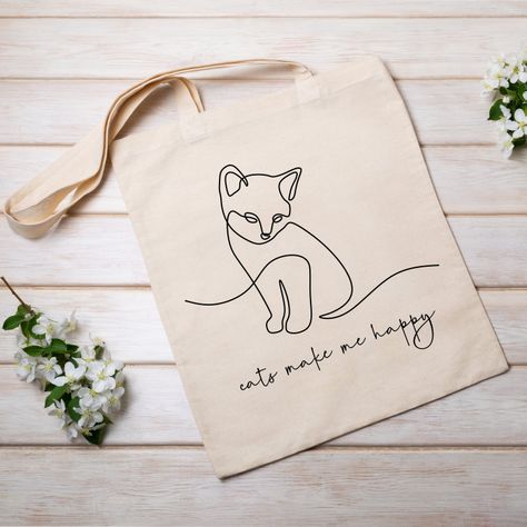 Cute happy cat tote bag | kitty lover | cat mom gift | funny grocery tote | kitten one line drawing | pet gift | cats make me happy by ZellaJoy on Etsy Tote Bag Cat Design, Cat Tote Bag, Cat Christmas Gift, Dashboard Header, Cats Tote Bag, Cat Mom Gifts, Cat Tote, One Line Drawing, Grocery Tote