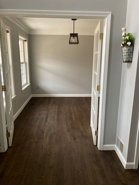 Hardwood Floors Trim Paint Walnut Floor White Walls, Light Gray Walls Dark Floors, Dark Flooring White Walls, Dark Wood Floors White Trim, Dark Wood Floor Beige Walls, Gray Walls With Dark Wood Floors, Original Hardwood Floor Stain Colors, Dark Floors Gray Walls, Gray Wall Wood Floor