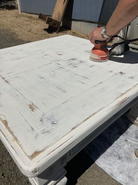 We purchased a large coffee table from an auction house where we buy a lot of furniture. It was solid wood with dents and scratches, so we knew we could make it look great! Here it is with all of those dent, scratches and discoloration on the sides and top, but that was what made it so appealing to redo. Ooh, all that worn wood on the top. Many people might sand it down and restain it, but we love using chalk paint and distressing it ourselves. We used this matte cottage white pa… Whitewashed Coffee Table, Refurbish Coffee Table Diy Ideas, White Distressed Coffee Table, Whitewash Coffee Table, Coffee Table Restoration, Distressed Table Top, Chalk Paint Coffee Table, Coffee Table Refinish, Distressed Coffee Table