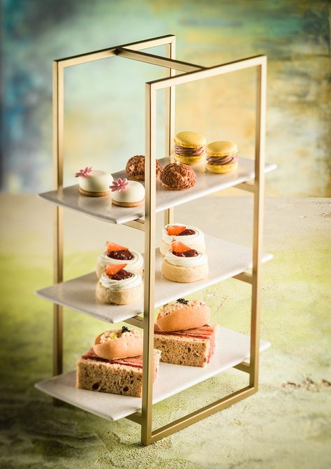 Move away from the traditional round shaped stands for Afternoon Tea...we love this rectangle bronze stand. It will make you stand out from the crowd! New Years Dinner Party, Chef Clothing, Afternoon Tea Stand, Tea Stand, Cardboard Display Stand, Buffet Stand, Dessert Table Birthday, New Years Dinner, Cake Rack