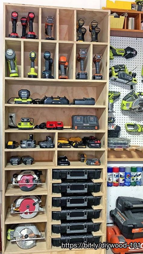 Cordless Drill Storage - Charging Station - Her Tool Belt. Organize your tools, free plans for a DIY cordless drill storage and battery charging station. #woodwork #howto #diy #howtodo #woodartist #woodworkingart #woodworkingart #woodworkingmachines Cordless Drill Storage, Battery Charging Station, Drill Storage, Custom Woodworking Projects, Garage Storage Inspiration, Garage Organization Tips, Garage Workshop Organization, Tool Storage Cabinets, Workbench Plans Diy