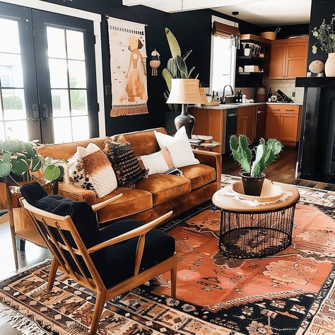 black_and_rust_living_room_boho 20 Farmhouse Grunge Aesthetic, Western Themed Living Room, Rust Living Room Ideas, Dark Boho Aesthetic, Black And Rust Living Room, Southwest Gothic, Cowboy Living Room, Western Boho Living Room, Rust Living Room