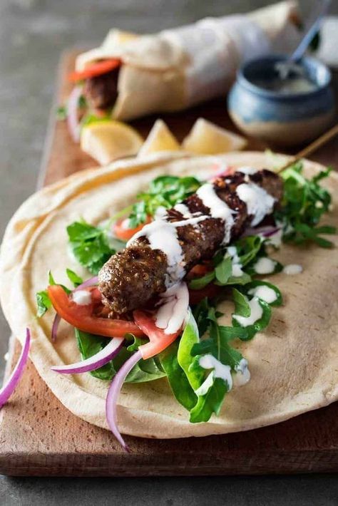 Turkish Lamb Recipes, Lamb Kebab, Turkish Lamb, Lamb Kofta, Braised Chicken Breast, Lamb Kebabs, Kofta Recipe, Sliced Tomatoes, Turkish Restaurant