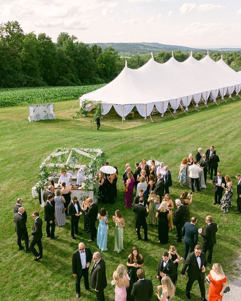 An outdoor cocktail hour before a tented wedding reception, with scenic views of Upstate New York all around for this destination weekend wedding at Windridge Estate . . . VENUE @windridgeestate PHOTOGRAPHY @lauraroseweddings CINEMATOGRAPHY @h2hmedia CONTENT CREATOR @followthebride_ PLANNING, DESIGN @shannonwellingtonweddings CATERING @diamondcatering_syracuse BAR @michaelshospitality FLORALS @beckandforthco ICE LUGE @theicefarm STATIONERY, SIGNAGE @hollywinnieco FURNITURE RENTALS @... Outdoor Cocktail Hour, Upstate Wedding, Tented Wedding Reception, Ice Luge, Cocktail Wedding Reception, Outdoor Cocktail, Cocktail Hour Wedding, Field Wedding, Weekend Wedding