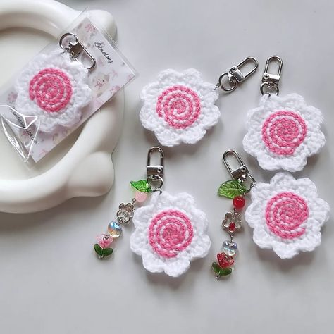 Crochet narutomaki keychains🍥 DM for order/enquiry 💌 The charms are made with high quality glass and alloy charms, beads and stainless steel findings. They are anti tarnish . . . . . Narutomaki pattern: @xuxu_crochet . . Tags🏷️: #crochet #crochetkeychain #crochetnarutomakikeychain #narutomaki #fishcake #charms #hookedon yarn #fyp #smallbusinessowner #aesthetic #ａｅｓｔｈｅｔｉｃ #aestheticcharms #gifts Crochet Charms, Keychain Beads, Beads Crochet, Crochet Beads, Keychain Crochet, Fish Cake, Crochet Keychain, Charm Keychain, Diy Crochet Projects